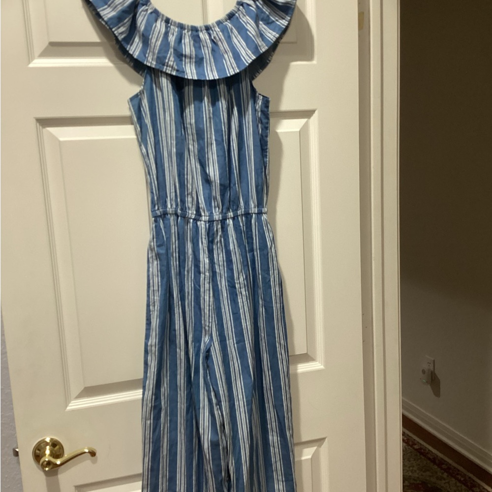Blue and white one piece outfit made of soft polyester, rayon, and spandex blend